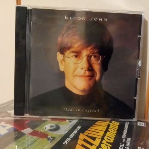 Elton john made - john,